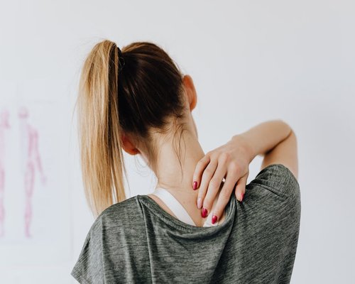 Person doing neck exercises to relieve tension